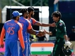 Indian players shook hands with Pakistan's Naseem Shah (R) after India beat Pakistan during the ICC men's Twenty20 World Cup 2024 group A cricket match.