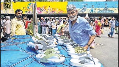 “We were allowed to sell chappals in our old licenses, which I inherited from my father,” said Khandudeo Ghanshyam, 69, who plies his trade on a footpath at Dadar station. (Raju Shinde/HT Photo) “We were allowed to sell chappals in our old licenses, which I inherited from my father,” said Khandudeo Ghanshyam, 69, who plies his trade on a footpath at Dadar station. (Raju Shinde/HT Photo)