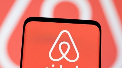 Airbnb logo is seen displayed in this illustration. (Reuters)