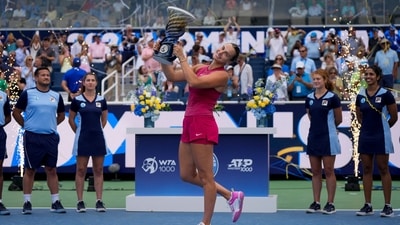 Aryna Sabalenka raises the Rookwood Cup after the women's championship match of the Cincinnati Open at the Lindner Family Tennis Center in Mason, Ohio, on Monday. (Reuters)