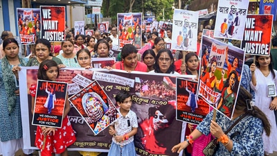 Artists and others take part in a protest against the alleged sexual assault and murder of a postgraduate trainee doctor in Kolkata, at Balurghat in Dakshin Dinajpur district, Monday, Aug. 19, 2024. (PTI Photo) (PTI) Artists and others take part in a protest against the alleged sexual assault and murder of a postgraduate trainee doctor in Kolkata, at Balurghat in Dakshin Dinajpur district, Monday, Aug. 19, 2024. (PTI Photo) (PTI)