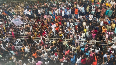 People block railway tracks to protest against the alleged sexual abuse of two girls at a school at Badlapur railway station in Thane on Tuesday. (PTI) People block railway tracks to protest against the alleged sexual abuse of two girls at a school at Badlapur railway station in Thane on Tuesday. (PTI)