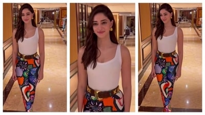 Ananya Pandey rocked her look and showed how to play with colors and amp up your style. She donned a simple white tank top to keep the focus on the statement piece of her ensemble—the leggings. Her leggings featured an abstract, psychedelic, colorful print. She paired them with a chunky belt, studded with gold stars. Keeping the accessories minimal, she chose a pair of gold hoops to match the gold studs on her belt (Instagram?@varinertchawla) Ananya Pandey rocked her look and showed how to play with colors and amp up your style. She donned a simple white tank top to keep the focus on the statement piece of her ensemble—the leggings. Her leggings featured an abstract, psychedelic, colorful print. She paired them with a chunky belt, studded with gold stars. Keeping the accessories minimal, she chose a pair of gold hoops to match the gold studs on her belt (Instagram?@varinertchawla)