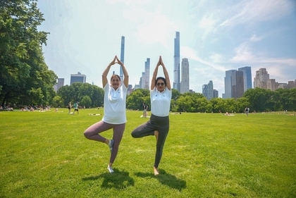 Women pose in Vrksasana or Tree pose at New York (X/Indian in New York) Women pose in Vrksasana or Tree pose at New York (X/Indian in New York)