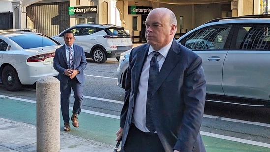 FILE - British tech magnate Mike Lynch enters federal court in San Francisco on March 26, 2024 (AP Photo/Michael Liedtke, File)(AP)