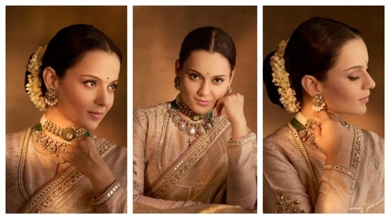 Kangana Ranaut looks regal in a beige saree with golden embroidery along the borders. Her hair, styled in an elegant bun, is adorned with a jasmine garland. Complementing her outfit with accents of green, she wore a green bindi. She layered two kundan and polki chokers, adding a touch of opulence to her ensemble.(Instagram/@kanganaranaut)