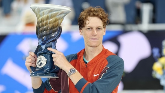 Jannik Sinner of Italy poses with the Rookwood Cup after defeating Frances Tiafoe of the United States during the men's final of the Cincinnati Open(Getty Images via AFP)