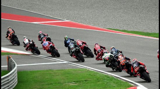 Riders compete in the Moto GP Indian Grand Prix at the Buddh International Circuit in Greater Noida on September 24, 2023. (Ajay Aggarwal/HT)