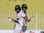 Pakistan's Saud Shakeel, front, and Saim Ayub run between the wicket during the first day of first cricket test match between Pakistan and Bangladesh Pakistan's Saud Shakeel, front, and Saim Ayub run between the wicket during the first day of first cricket test match between Pakistan and Bangladesh