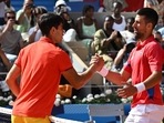 Novak Djokovic of Serbia (R) shakes hands with Carlos Alcaraz of Spain (L).(EPA-EFE) Novak Djokovic of Serbia (R) shakes hands with Carlos Alcaraz of Spain (L).(EPA-EFE)