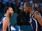 TOPSHOT - USA's #04 Stephen Curry (L) and USA's #07 Kevin Durant celebrates after scoring in the men's Gold Medal basketball match between France and USA during the Paris 2024 Olympic Games at the Bercy Arena in Paris on August 10, 2024.(AFP) TOPSHOT - USA's #04 Stephen Curry (L) and USA's #07 Kevin Durant celebrates after scoring in the men's Gold Medal basketball match between France and USA during the Paris 2024 Olympic Games at the Bercy Arena in Paris on August 10, 2024.(AFP)