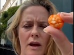 Alicia Silverstone shows the inside of the berry