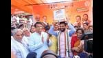 Haryana chief minister Nayab Singh Saini launched the BJP’s election campaign by flagging off a van, ‘Sankalp Patra Rath’, in Panchkula for inviting suggestions from every community to be included in the party’s manifesto for the assembly elections slated for October 1. (HT Photo) Haryana chief minister Nayab Singh Saini launched the BJP’s election campaign by flagging off a van, ‘Sankalp Patra Rath’, in Panchkula for inviting suggestions from every community to be included in the party’s manifesto for the assembly elections slated for October 1. (HT Photo)