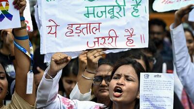Doctors protest demanding justice against the alleged sexual assault and murder of a postgraduate trainee doctor of the Kolkata RG Kar Hospital, at Jantar Mantar in Delhi on Wednesday. (ANI)