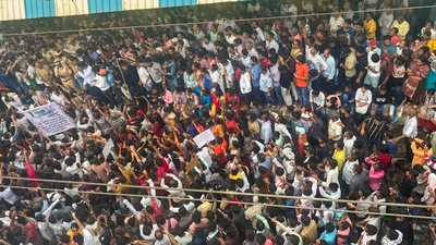People block railway tracks to protest against the alleged sexual abuse of two girls at a school at Badlapur railway station in Thane on Tuesday. (PTI) People block railway tracks to protest against the alleged sexual abuse of two girls at a school at Badlapur railway station in Thane on Tuesday. (PTI)