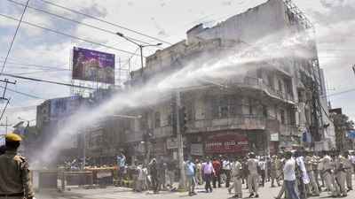 Patna: Police personnel use water cannon to disperse people protesting during the 'Bharat Bandh' called by SC/ST organisations over reservation issue, in Patna, Wednesday, Aug. 21, 2024. (PTI Photo) Patna: Police personnel use water cannon to disperse people protesting during the 'Bharat Bandh' called by SC/ST organisations over reservation issue, in Patna, Wednesday, Aug. 21, 2024. (PTI Photo)