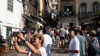 Tourists visit the old center of Sintra, Portugal. (AP) Tourists visit the old center of Sintra, Portugal. (AP)