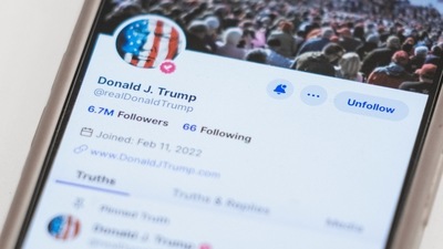 The Truth Social account for former President Donald Trump is seen on a mobile device. (AP Photo/John Minchillo, File) (AP) The Truth Social account for former President Donald Trump is seen on a mobile device. (AP Photo/John Minchillo, File) (AP)