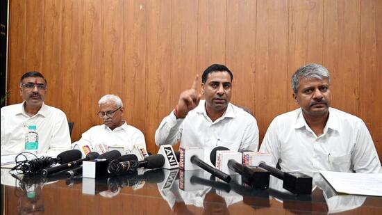 District bar association president Amarjeet Yadav and others at a press conference in Gurugram on Wednesday. (Parveen Kumar/HT)