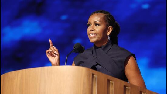 Former US First Lady Michelle Obama speaks on the second day of the Democratic National Convention (DNC) on Tuesday at the United Center in Chicago, Illinois. (AFP)