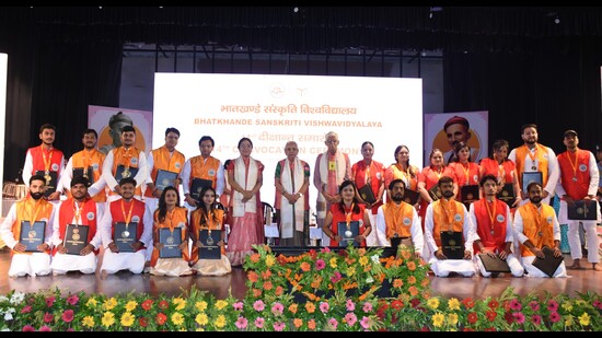 Medal winners with governor Anandiben Patel and other guests. (HT)