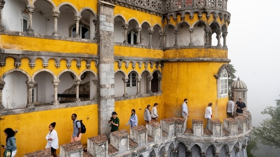 Tourists visit the 19th century Pena Palace in Sintra, Portugal, (AP) Tourists visit the 19th century Pena Palace in Sintra, Portugal, (AP)