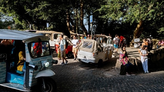 Tuk-tuks drop off and pick up tourists at the gate of the 19th century Pena Palace in Sintra, Portugal. (AP) Tuk-tuks drop off and pick up tourists at the gate of the 19th century Pena Palace in Sintra, Portugal. (AP)