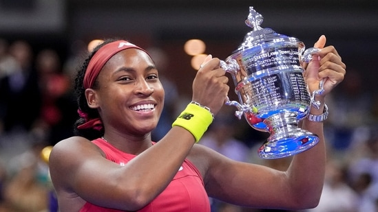 Coco Gauff holds up the championship trophy after defeating Aryna Sabalenka, of Belarus, in the women's singles final of the US Open tennis championships in 2023(AP)