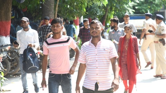 Candidates are seen coming out from an examination center after appearing for the Bihar Police Constable exam, at A N College, Patna(Santosh Kumar )