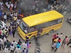 School bus with children on board almost burns after driving over a burning tyre during the Bharat Bandh School bus with children on board almost burns after driving over a burning tyre during the Bharat Bandh