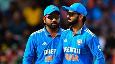 India's Virat Kohli (R) and captain Rohit Sharma gestures during a match. (AFP) India's Virat Kohli (R) and captain Rohit Sharma gestures during a match. (AFP)
