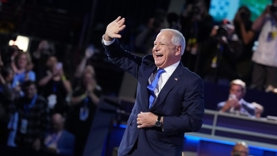 Minnesota Gov. Tim Walz arrives to speak on stage during the third day of the Democratic National Convention at the United Center on August 21, 2024 in Chicago, Illinois. (Getty Images via AFP) Minnesota Gov. Tim Walz arrives to speak on stage during the third day of the Democratic National Convention at the United Center on August 21, 2024 in Chicago, Illinois. (Getty Images via AFP)