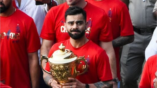 Virat Kohli during IPL's title-winning celebrations in Bengaluru Virat Kohli during IPL's title-winning celebrations in Bengaluru