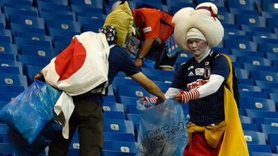 Japanese Football Team Fans Clean Stadium