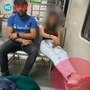 In Mumbai local train woman passanger threatens other passenger who objected her sitting with legs on seat