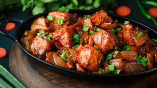Paneer Manchurian - Paneer cubes cooked in a rich Manchurian gravy served in a bowl