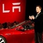 elon musk with Tesla HT