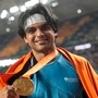 Neeraj Chopra poses after winning the gold medal in the Men's javelin throw final during the World Athletics Championships in Budapest, (Hungary) 