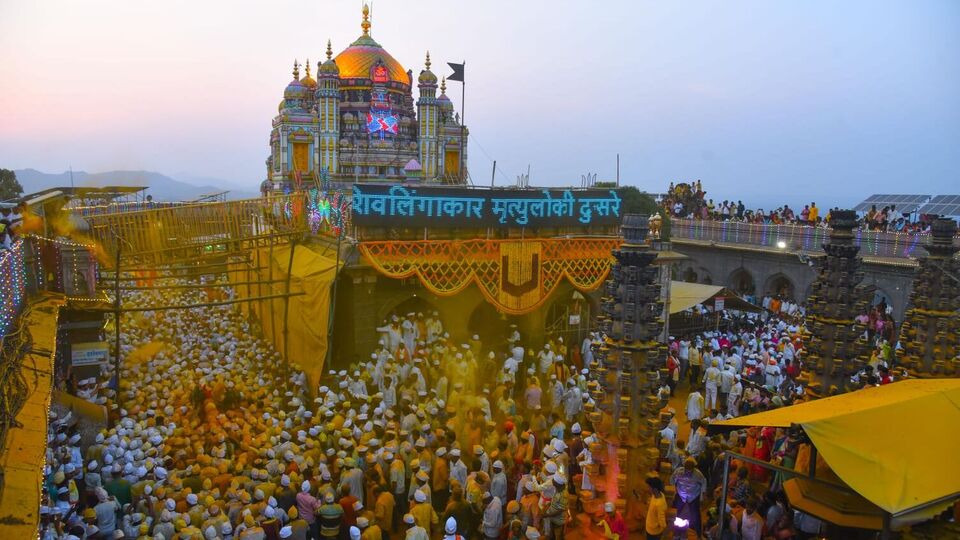 The image of Devotees throwing turmeric powder at jejuri, Mahaharashtra,  India, Stock Photo, Picture And Rights Managed Image. Pic.  WDP-ZB855-296812-008 | agefotostock