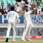 India's Jasprit Bumrah and teammates celebrate
