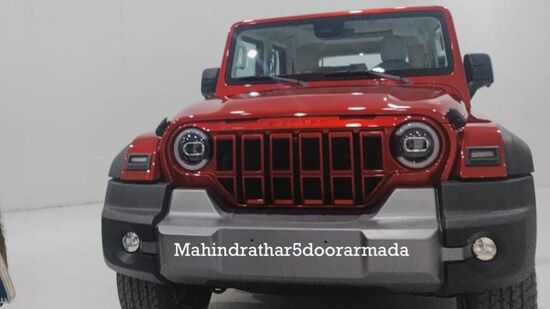 The most prominent change lies in the grille. The Mahindra Thar Armada sports a unique six-slot design with a horizontal slat running across, replacing the familiar grille of the three-door model. 