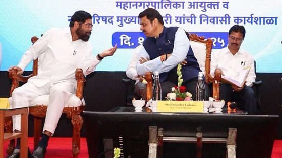 Maharashtra Chief Minister Devendra Fadnavis interacts with State Deputy Chief Minister Eknath Shinde