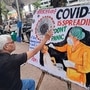 Mumbai, May 21 (ANI): A teacher of Gurukul School of Art makes an awareness painting of COVID 19, in Mumbai on Wednesday. (ANI Photo)
