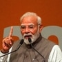 TOPSHOT - India's Prime Minister Narendra Modi addresses the gathering during an event marking 20 years of the Gujarat Urban Growth Story at Gandhinagar, in India's state of Gujarat, on May 27, 2025. (Photo by Sam PANTHAKY / AFP)