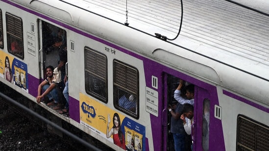 Mumbai, India. May 26, 2025: A local train stopped between Kurla and Sion due to heavy rain. Mumbai City witnessed heavy rain and waterlogging on Monday, The India Meteorological Department (IMD) issued a red alert to Mumbai and neighbouring Thane and Palghar districts. Mumbai, India. May 26, 2025.  (Photo by Raju Shinde/ Hindustan Times)