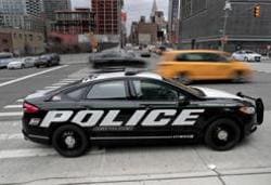 A prototype of the Ford Fusion police hybrid car sits along 11th Avenue in New York. Ford Motor Co., which sells more police cars in the U.S. than any other automaker, says it will offer a police pursuit version of the hybrid Fusion midsize sedan, in response to requests from cities nationwide. A prototype of the Ford Fusion police hybrid car sits along 11th Avenue in New York. Ford Motor Co., which sells more police cars in the U.S. than any other automaker, says it will offer a police pursuit version of the hybrid Fusion midsize sedan, in response to requests from cities nationwide.