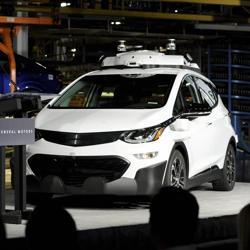 General Motors chairman and CEO Mary Barra updates the media on the company's autonomous vehicle development program at GM's Orion Assembly in Lake Orion, Michigan on Tuesday. Barra stands next to a self-driving Chevrolet Bolt EV, one of 130 the company has built at a factory in suburban Detroit, making it among the first automakers to mass produce self-driving vehicles. General Motors chairman and CEO Mary Barra updates the media on the company's autonomous vehicle development program at GM's Orion Assembly in Lake Orion, Michigan on Tuesday. Barra stands next to a self-driving Chevrolet Bolt EV, one of 130 the company has built at a factory in suburban Detroit, making it among the first automakers to mass produce self-driving vehicles.