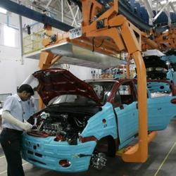 A worker assembles a new vehicle on the assembly line at the newly inaugurated plant of General Motors Corp. in Talegaon, about 160 kilometers northeast of Mumbai. A worker assembles a new vehicle on the assembly line at the newly inaugurated plant of General Motors Corp. in Talegaon, about 160 kilometers northeast of Mumbai.