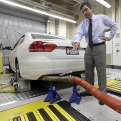 In this Sept 30, 2015, file photo, a 2013 Volkswagen Passat with a diesel engine is evaluated at the emissions test lab in El Monte, Calif. Real world pollution from diesel trucks, buses and cars globally is more than 50% higher than what government lab testing says it should be. And that translates to an extra 38,000 deaths worldwide from soot and smog, a new study say.