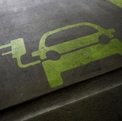 A sign is painted on a parking space for electric cars inside a car park in Hong Kong January 29, 2012. A sign is painted on a parking space for electric cars inside a car park in Hong Kong January 29, 2012.